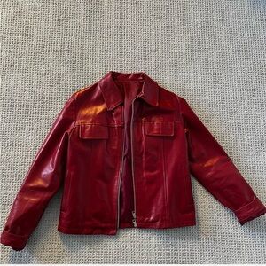 Real leather, red vintage jacket. Medium. Bought in France. Perfect condition.